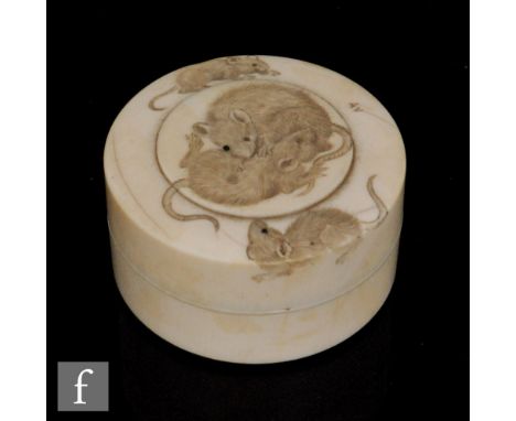 A late 19th to early 20th Century Japanese Meji period carved ivory box decorated with tumbling rats, signature to the cover,