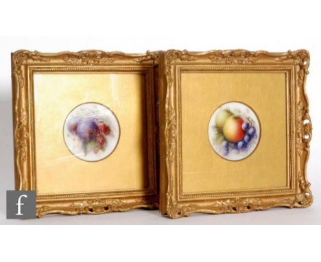 A pair of early 20th Century framed Royal Worcester Fallen Fruits porcelain plaques decorated by R. Seabright, the first hand