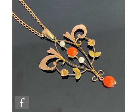 An early 20th Century 9ct open work pendant set with seed pearl and coral, length 4cm, stamped 9ct to reverse, to a 9ct rose 