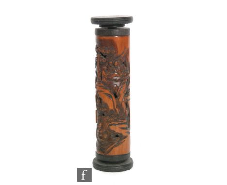 A 20th century Chinese carved bamboo scroll holder with pierced decoration detailed with figures and buffalo in a landscape, 