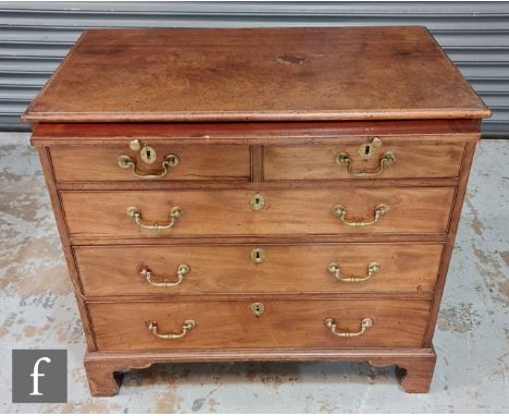 A mid Georgian mahogany bachelor chest of drawers with upper brushing slide above two short and three graduated long drawers 
