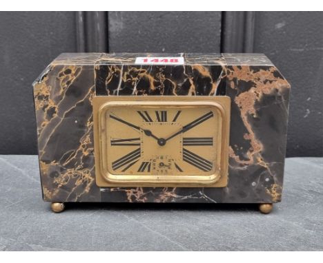An Art Deco marble mantel clock, 16.5cm wide.&nbsp; 