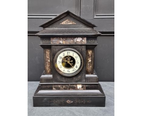 A late 19th century slate and marble mantel clock,&nbsp;53cm high, with pendulum. 