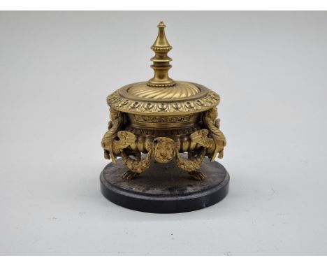 A Renaissance revival gilt bronze inkwell and cover,&nbsp;on slate base, 14cm high. 