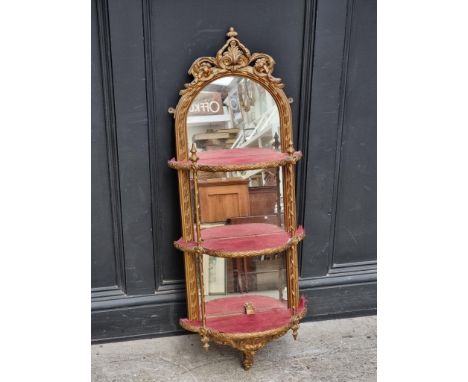 An old giltwood and mirrored glass wall shelf, 106cm high.&nbsp; 