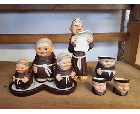 A small group of Goebel novelty monk figures,&nbsp;to include a cruet set. 