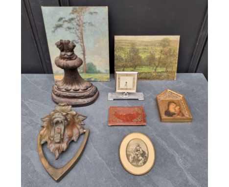 A mixed lot,&nbsp;to include a Victorian brass door knocker; an Art Deco desk timepiece; and two unframed paintings by George