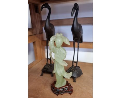 A pair of Japanese bronze crane and tortoise figure groups,&nbsp;25cm high,&nbsp;and a Chinese jade figure of Guanyin, (losse