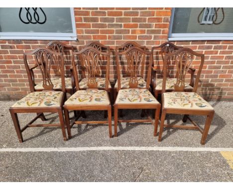 A set of eight George III style mahogany dining chairs, each with tapestry slip in seat, to include a pair of elbow chairs. (