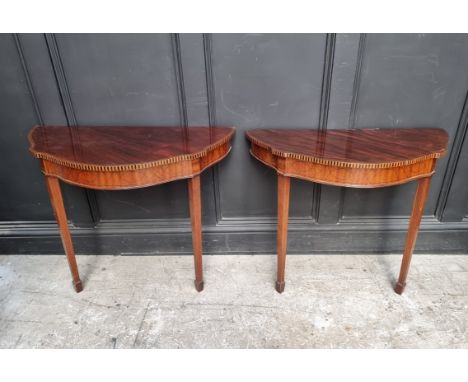 A pair of early 20th century mahogany and inlaid console tables, 80cm wide.&nbsp; 