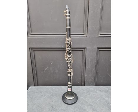 A clarinet,&nbsp;on stand. 