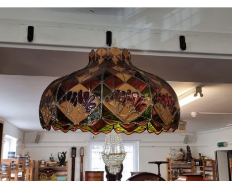 A large Tiffany style lamp shade, 64.5cm wide.&nbsp; 