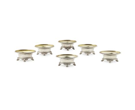 A set of six George III saltsPaul Storr, London 1805, of oval 'bath' form, cast gadroon borders, raised on four bracket feet 
