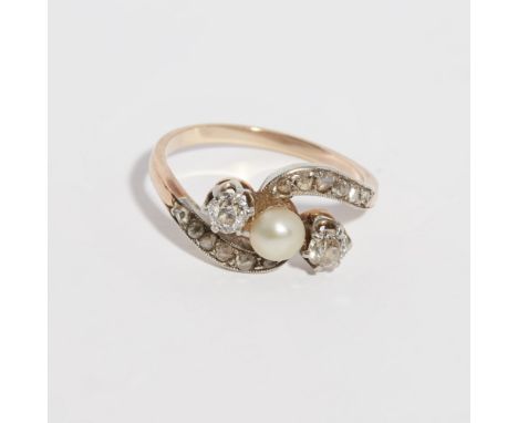 A pearl and diamond set crossover ringset with a bouton pearl between two old round cut diamonds, the curving shoulders set w