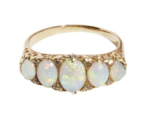 A Victorian opal and diamond set ringclaw set with five graduated oval opal cabochons with rose cut diamond detail, to an unm