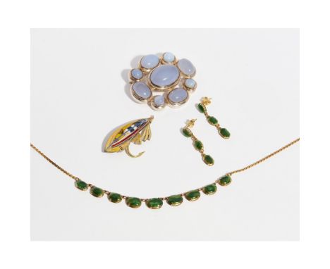 A collection of gem set jewelleryto include a large chalcedony set brooch; a mottled green jade set necklace and matching pen