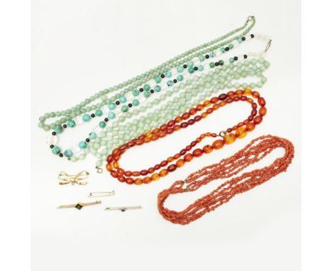 A collection of gem set and beaded jewelleryto include a seed pearl set bar brooch, stamped 9ct; a bow brooch, stamped 9ct; a