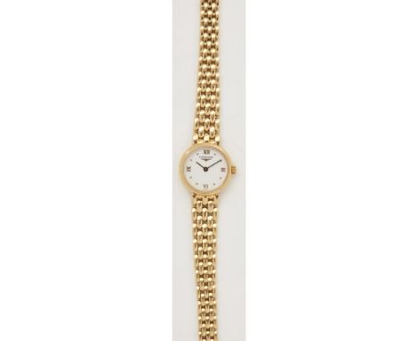 A lady's 18ct gold wrist watch, LonginesPrestige model, Ref L6 107 6, plain white dial with Roman numerals to the quarters an