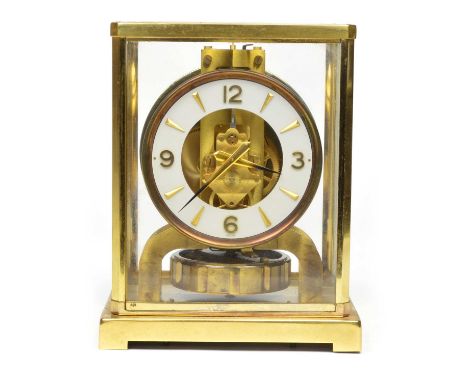 Jaeger-LeCoultre Atmos mantel clock with white and brass chapter ring dial, within a brass glazed case. Serial Number: 116503