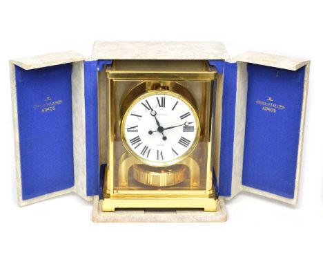 Jaeger-LeCoultre Atmos clock with original case and instruction booklet. The clock has a white dial with black Roman numerals
