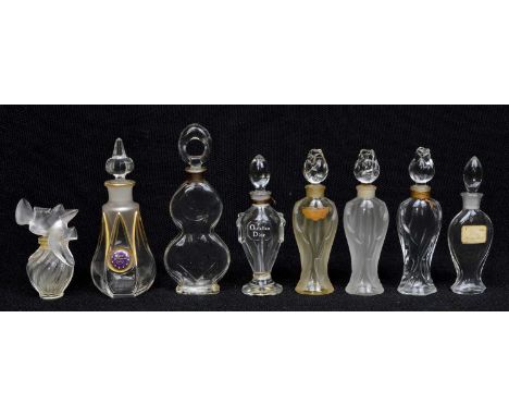 8 perfume bottles to include two frosted glass Guerlain rosebud Shalimar bottles and one unfrosted 12cm high, a Nina Ricci 'L