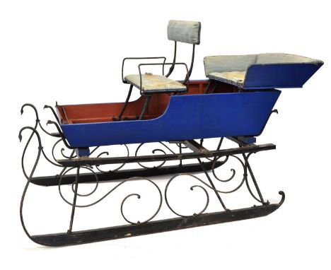 Early 20th-century Troika sled, the main carriage fitted with folding front and rear upholstered seat, all mounted on wrought