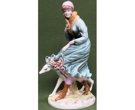Large Italian glazed ceramic figure group depicting a lady walking her dog in the wind. Approx. 44cms H used condition. tail 