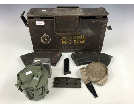A British Army ammunition box, machine gun accessories, Bren gun magazines etc.