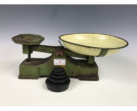 A set of vintage kitchen scales with weights
