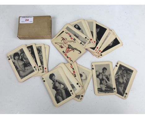 A set of 1950s-1960s "What the Butler Saw" risqué playing cards 