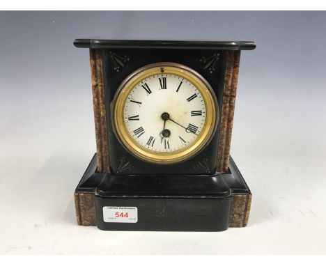 A Victorian black slate mantel clock