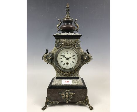 A gilt metal and marble reproduction mantel clock