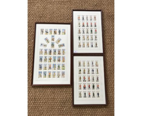 Three framed sets of military uniform cigarette card prints