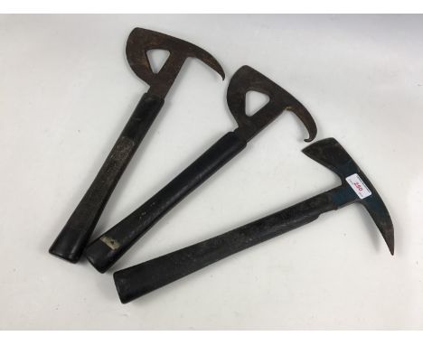 Two Second World War RAF aircrew escape axes, together with an ARP axe