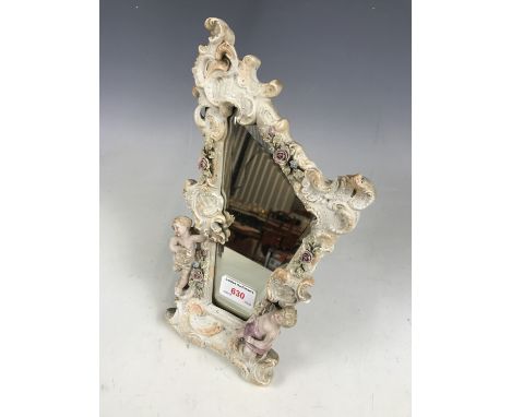 A late 19th century rococo style porcelain easel mirror 