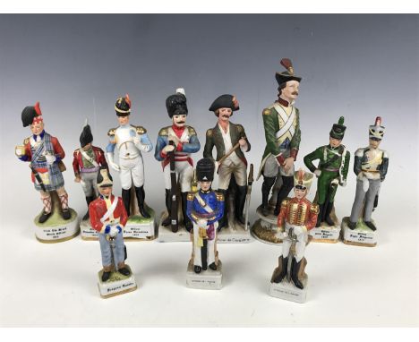 Eleven porcelain military figurines including an 1815 Officer of the Horse Grenadiers, an 1815 Officer of the Light Dragoons 