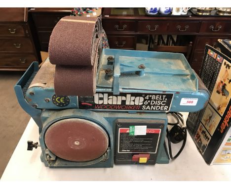 A Clarke woodworker 4" belt with 6" disc sander