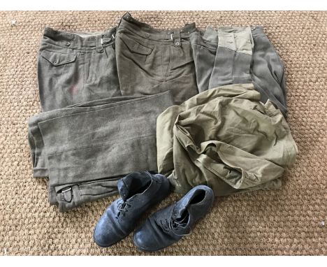 Second World War British Army despatch riders' breaches, together with three pairs of post-War Battledress trousers, a parach
