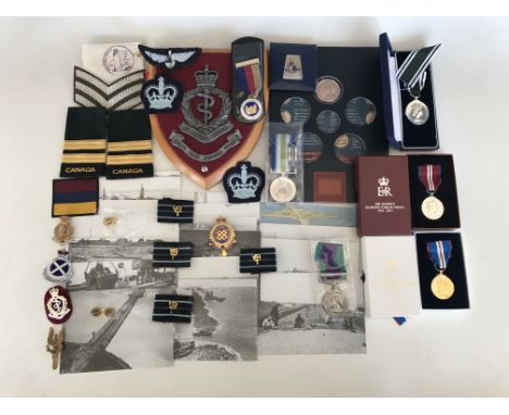 An Ambulance Service (Emergency Duties) Long Service &amp; Good Conduct medal to Samuel Capstick, together with a Royal Army 