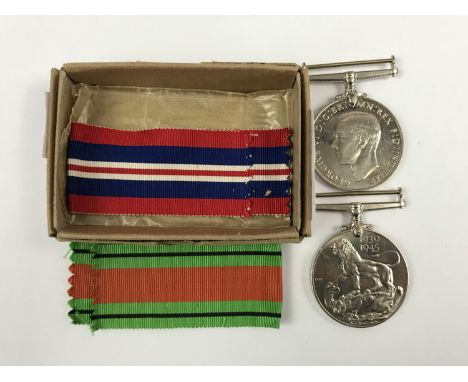 Two Second World War campaign medals in carton addressed to F/L K V Taylor, "The Anchorage", Whalley Road, Wilpshire, Blackbu