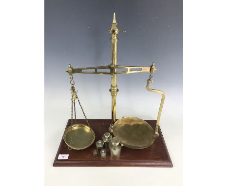 A set of early 20th Century Librasco brass counter-top beam scales, together with a set of metric "German silver" weights, 50