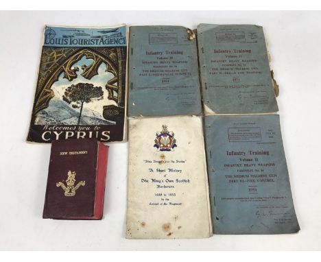A 1940s King's Own Scottish Borderers New Testament, together with post-War British Army machine gun training manuals etc.