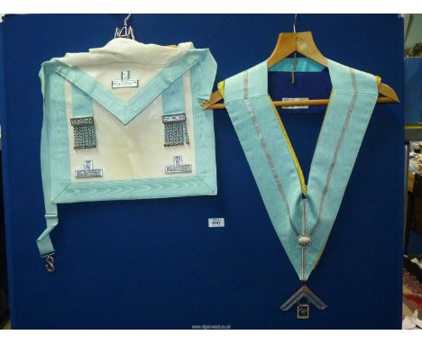 A pale blue Masonic sash and apron plus one other sash.