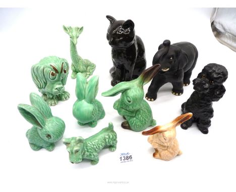 A quantity of Sylvac models to include: black cat and elephant, green giraffe and rabbits, etc.