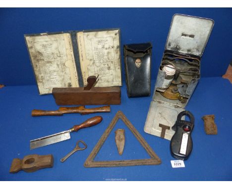 A quantity of miscellaneous tools and equipment to include: a tenon saw, an early 20th century stove, an ancient wrought iron