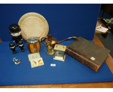 A quantity of miscellaneous to include: a bread board, a family bible, Treen tea caddy, carriage clock, copper watering can, 