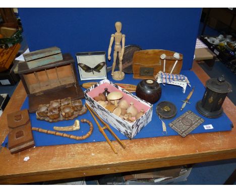 A quantity of Treen to include: boxes, turned vases, an articulated model, egg cups, pipe rack, vintage hardwood green bowl, 