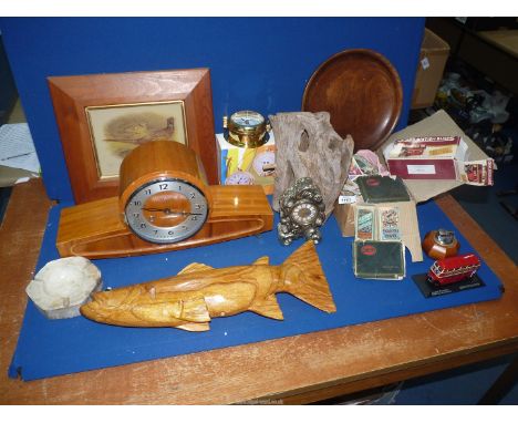A quantity of miscellaneous to include: a large carved fish, a mantle clock, cigarette cards, lighter, etc.