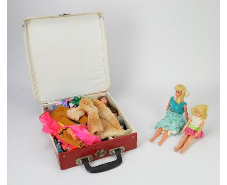 1969 Mattel Barbie and Skipper in original "Boutique" case with various outfits and accessories 