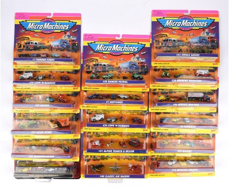 Micro Machines by Galoob collection of 17 boxed sets (75030 - 16 and 74972 -1). Includes number 1 Famous Fords, number 29 Rac